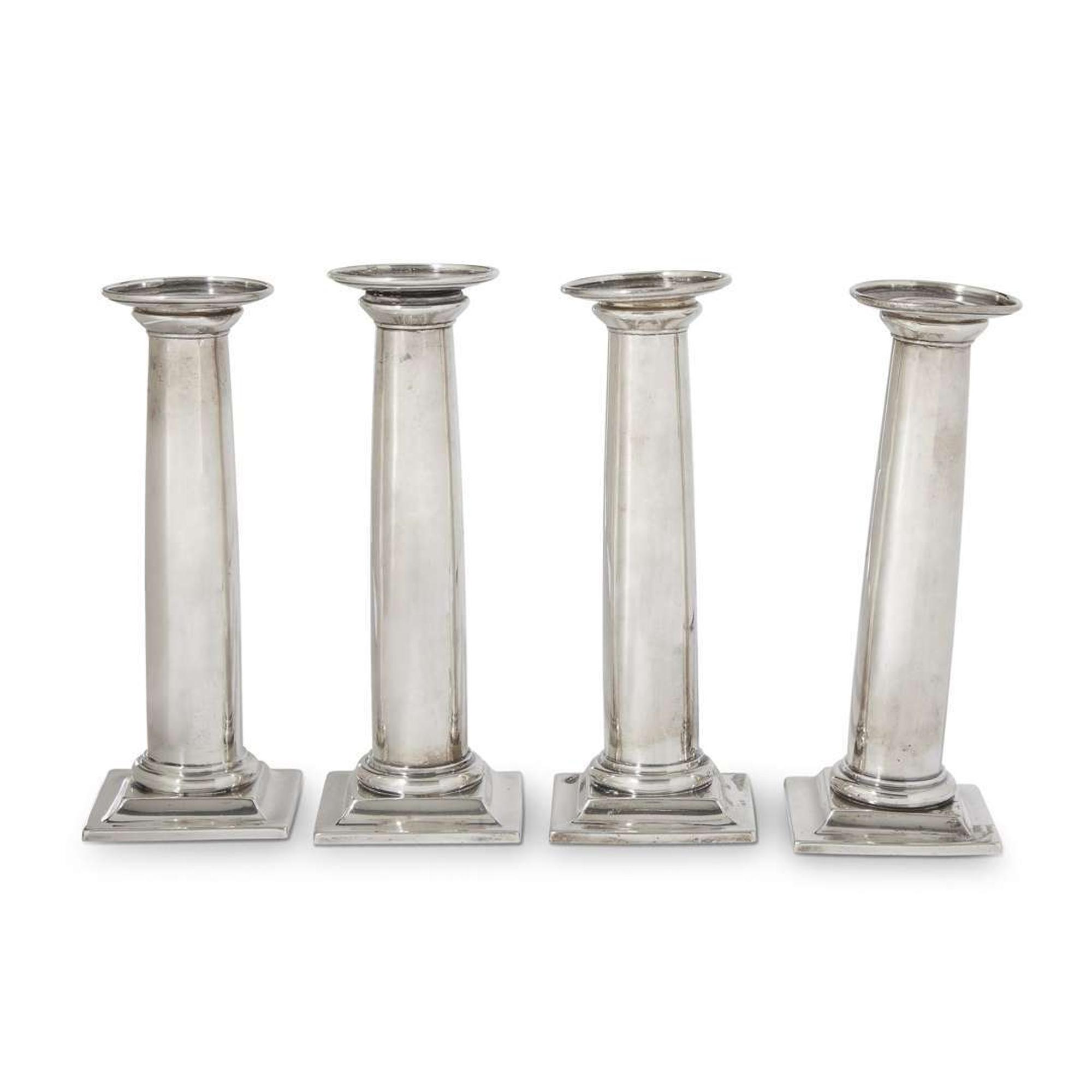 Four American sterling silver candlesticks in the form of Doric columns international silver co., meriden, connecticut, 20th century