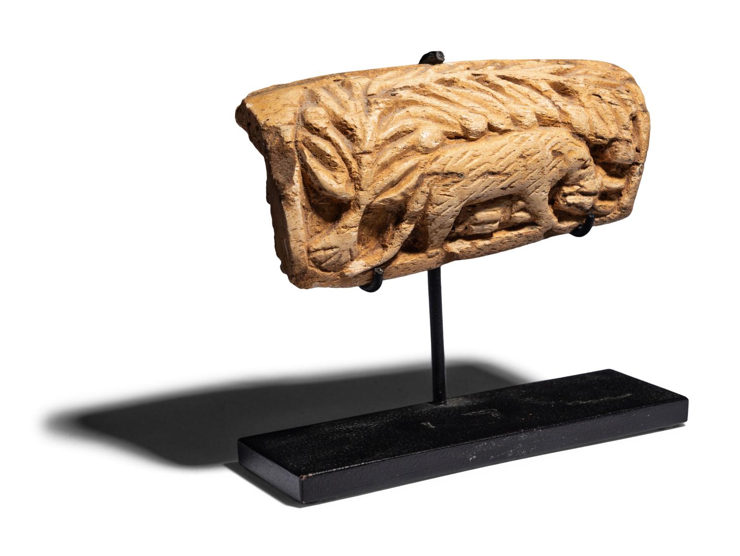 A Coptic Bone Fragment with a Lion Hunting Scene