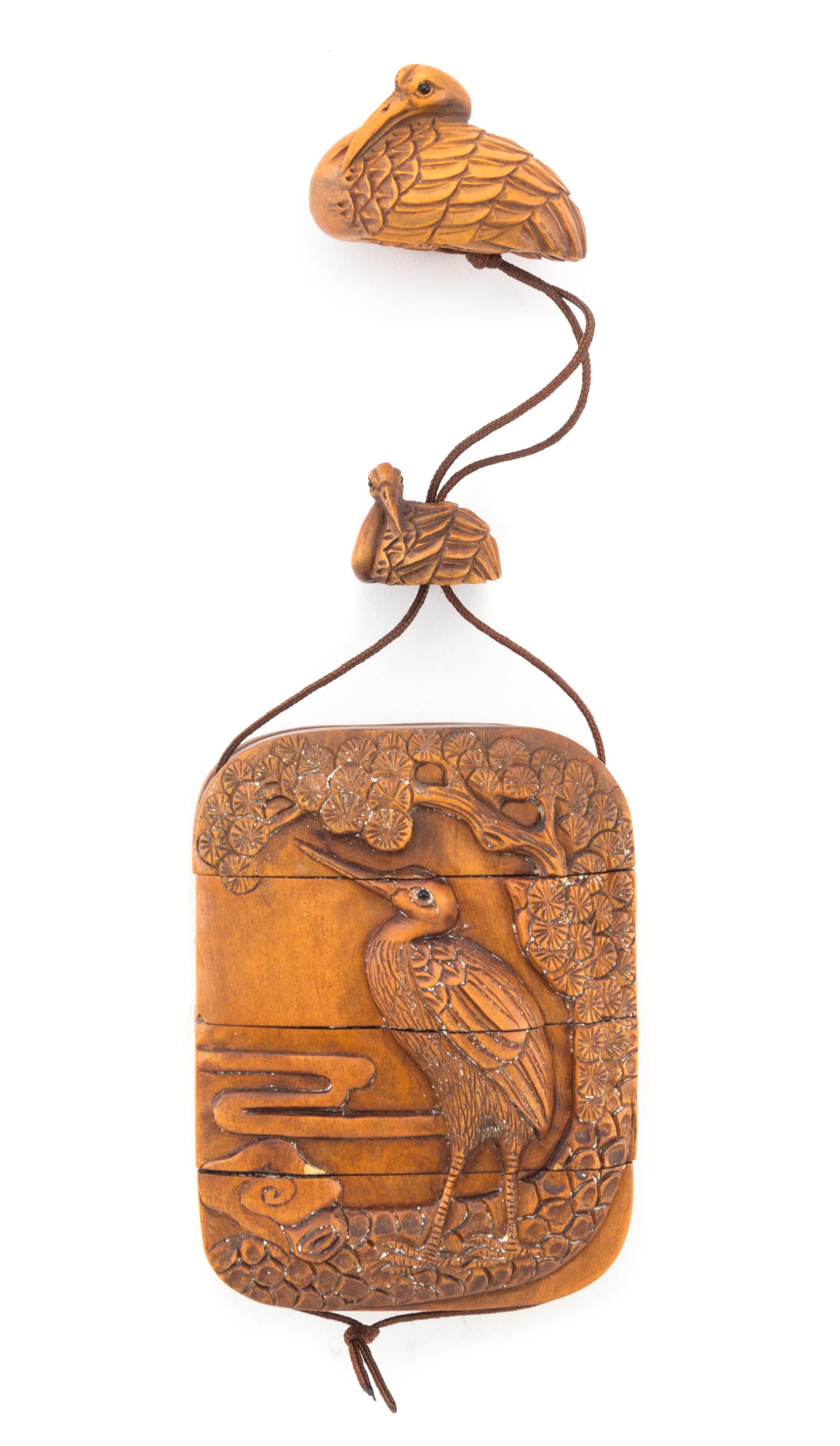 A Carved Boxwood Inro Height 2 7/8 inches.