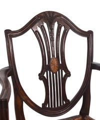 A Pair of George III Mahogany Armchairs