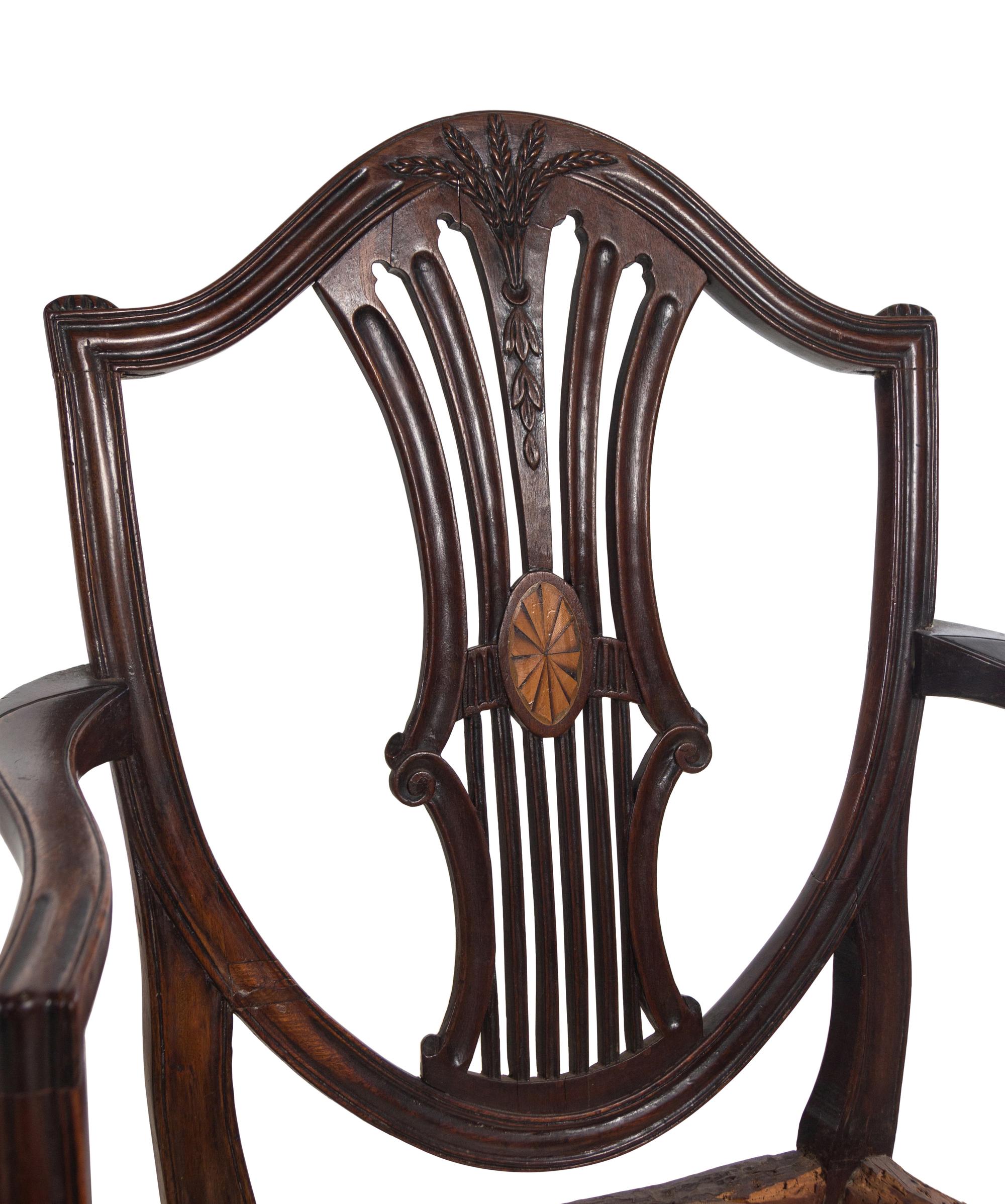A Pair of George III Mahogany Armchairs