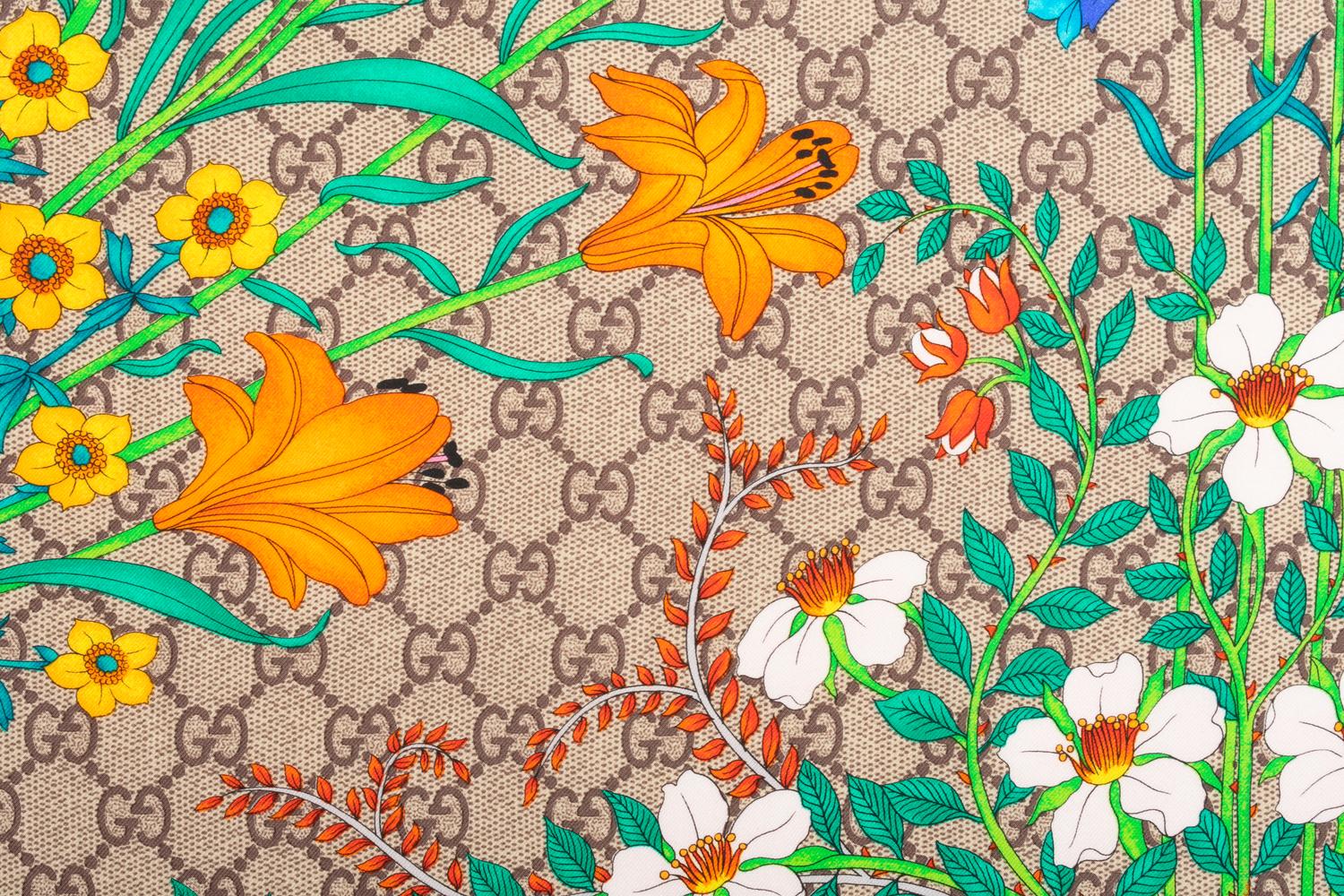 Four Scarves and One Pair of Gloves: Three Hermès, One Gucci, and One Pair of Hermès Gloves