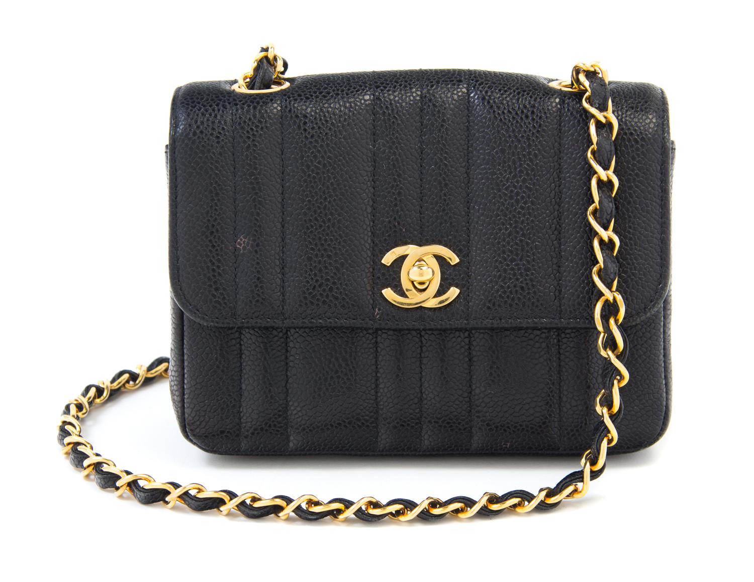 A Chanel Black Caviar Quilted Small Flap Bag, 7" x 5" x 2"; Strap drop: 21".