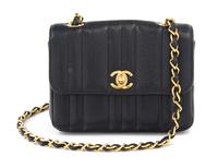 A Chanel Black Caviar Quilted Small Flap Bag, 7" x 5" x 2"; Strap drop: 21".