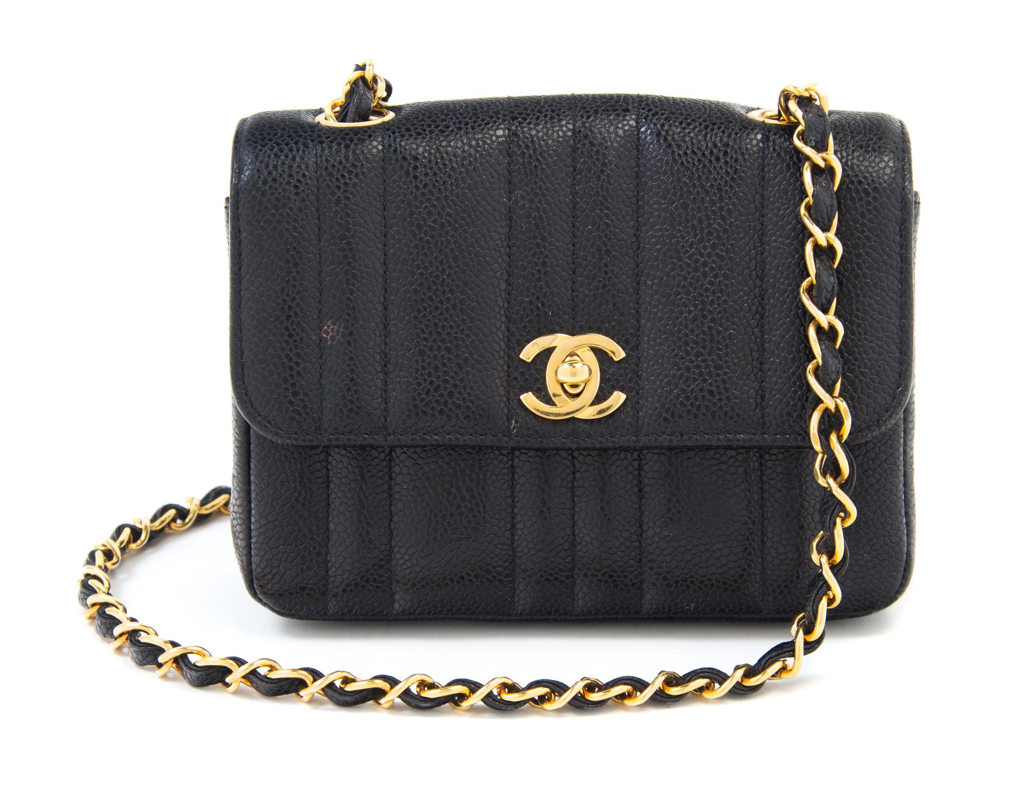 A Chanel Black Caviar Quilted Small Flap Bag, 7" x 5" x 2"; Strap drop: 21".