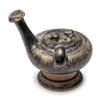 A Campanian Black-Glazed Guttus with a Grotesque