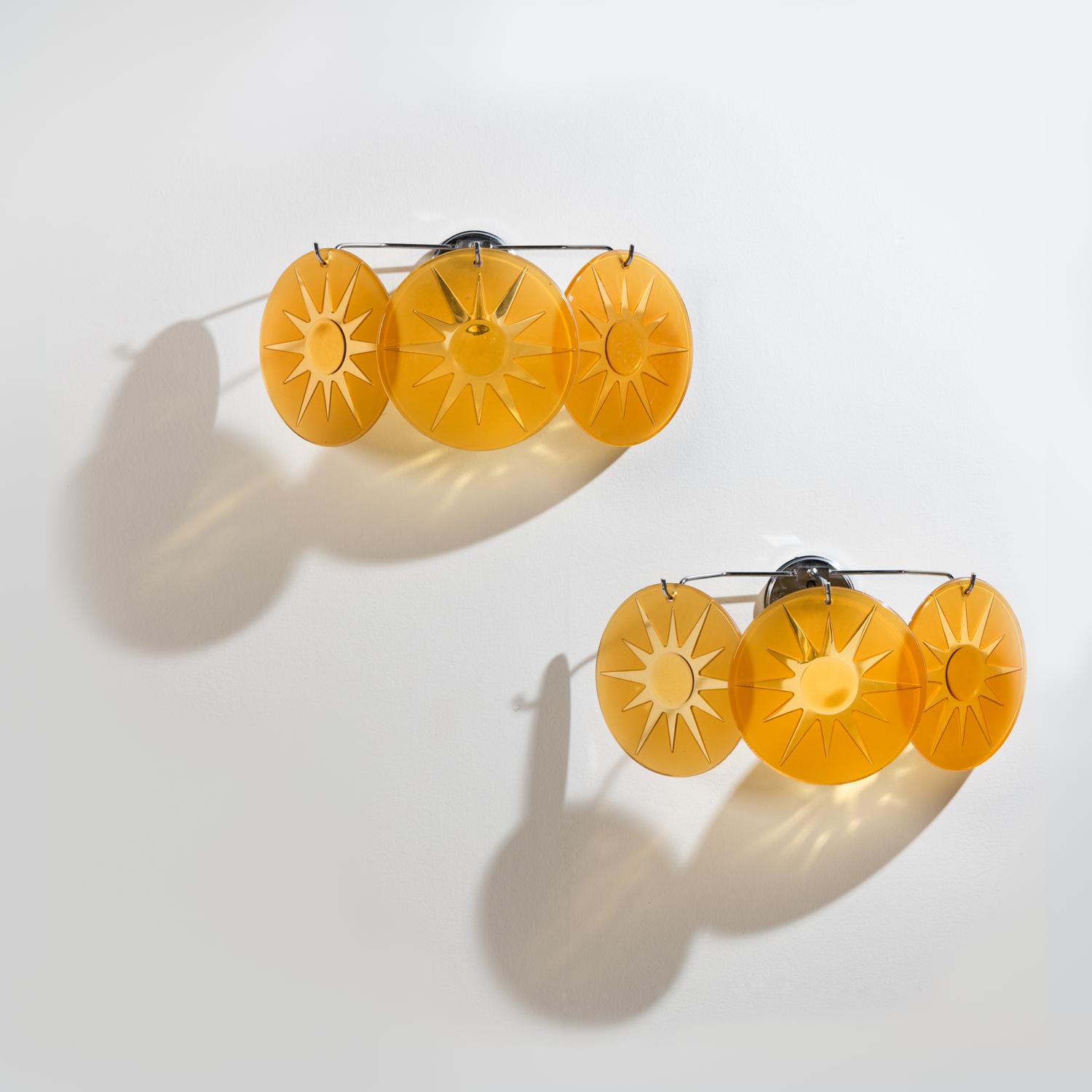 Group of Four Amber Glass Three-Light Wall Sconces