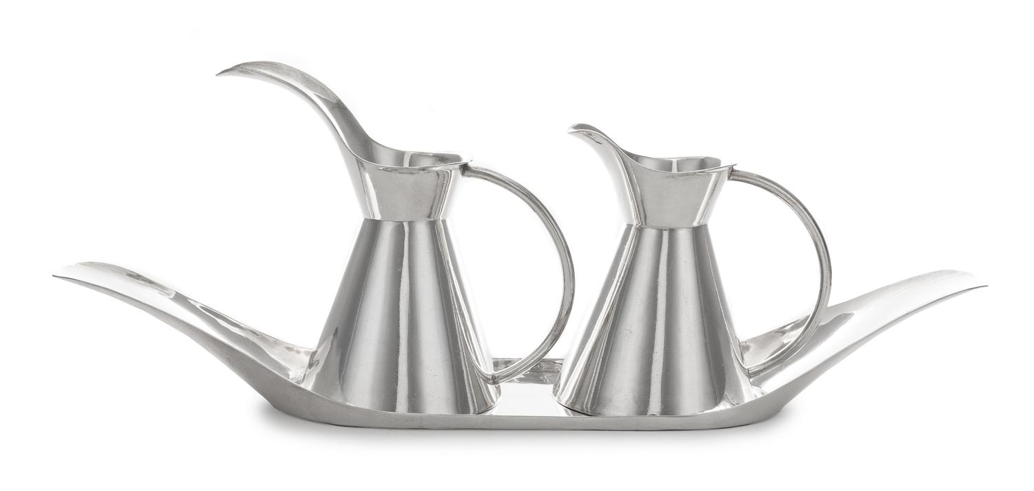 A Mexican Silver Creamer and Milk Pot Tray, Sanborns, Mexico City, 20th Century, with conical bodies and oversized spouts, the oval tra