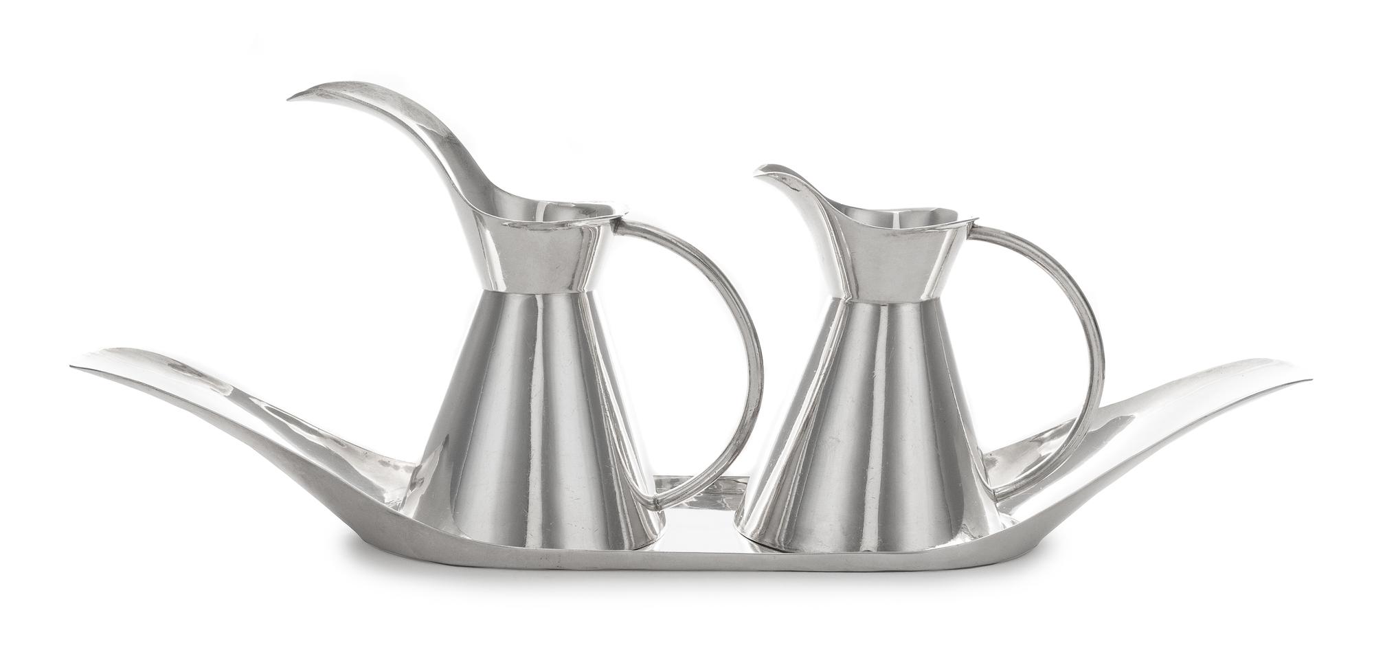 A Mexican Silver Creamer and Milk Pot Tray, Sanborns, Mexico City, 20th Century, with conical bodies and oversized spouts, the oval tra