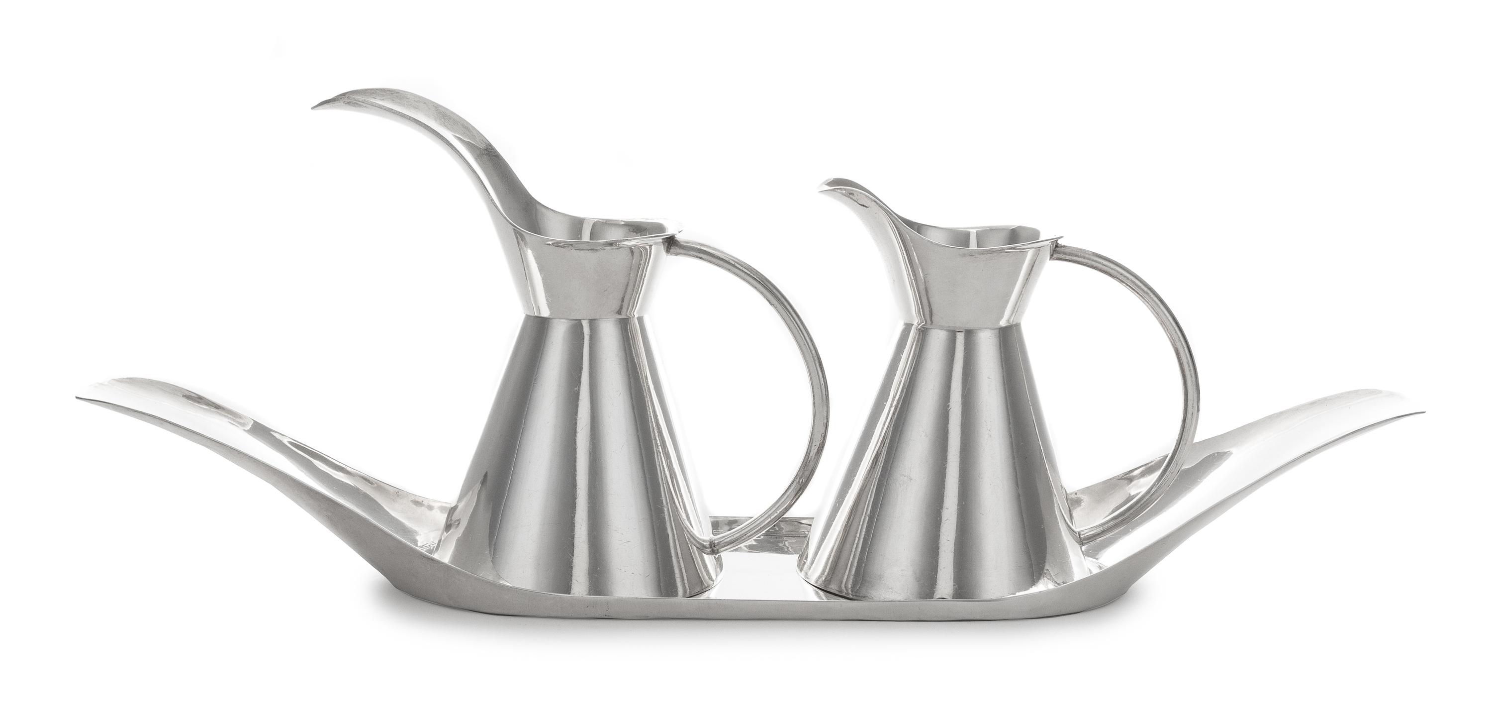 A Mexican Silver Creamer and Milk Pot Tray, Sanborns, Mexico City, 20th Century, with conical bodies and oversized spouts, the oval tra