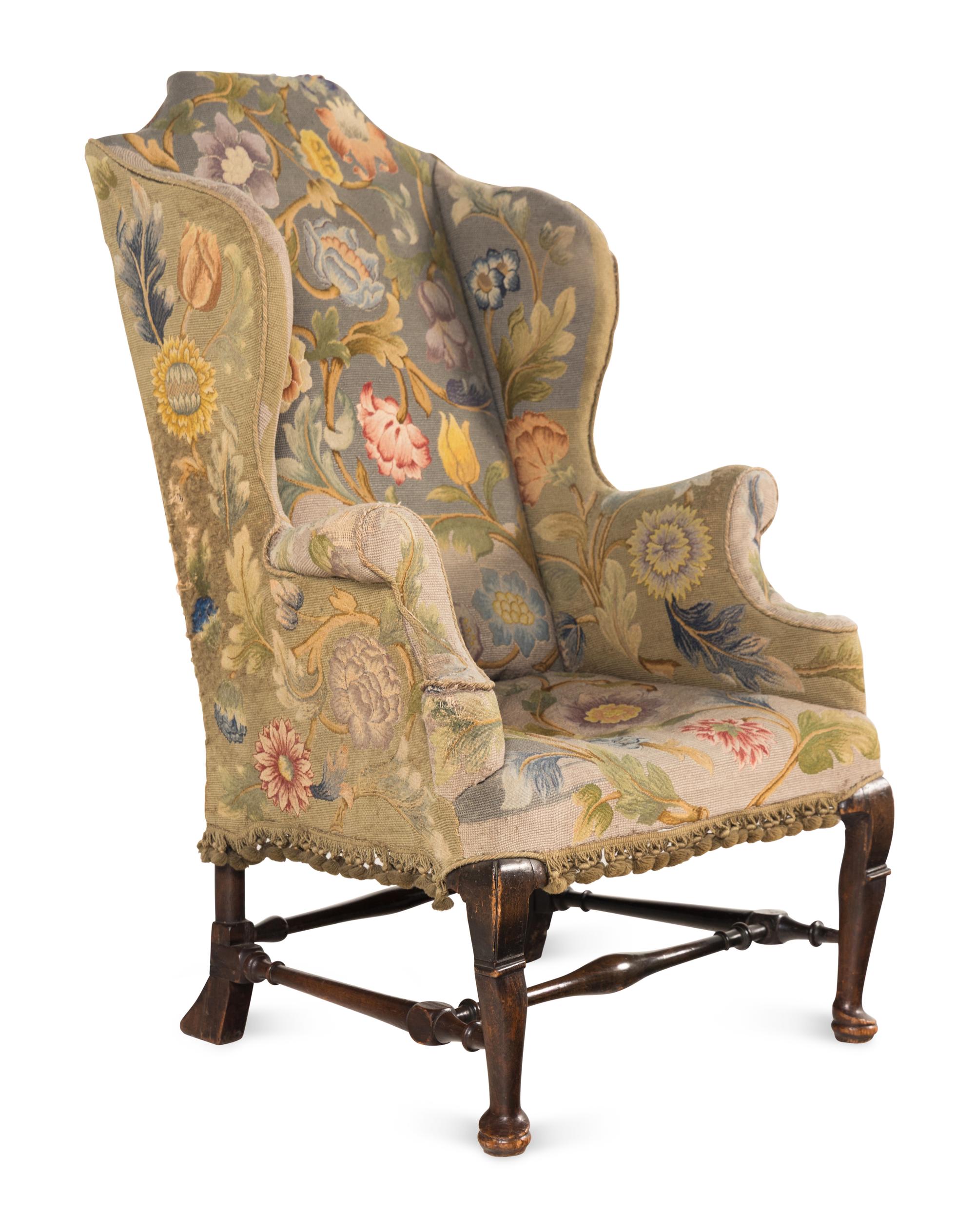 A Queen Anne Beechwood and Pine Wingback Armchair