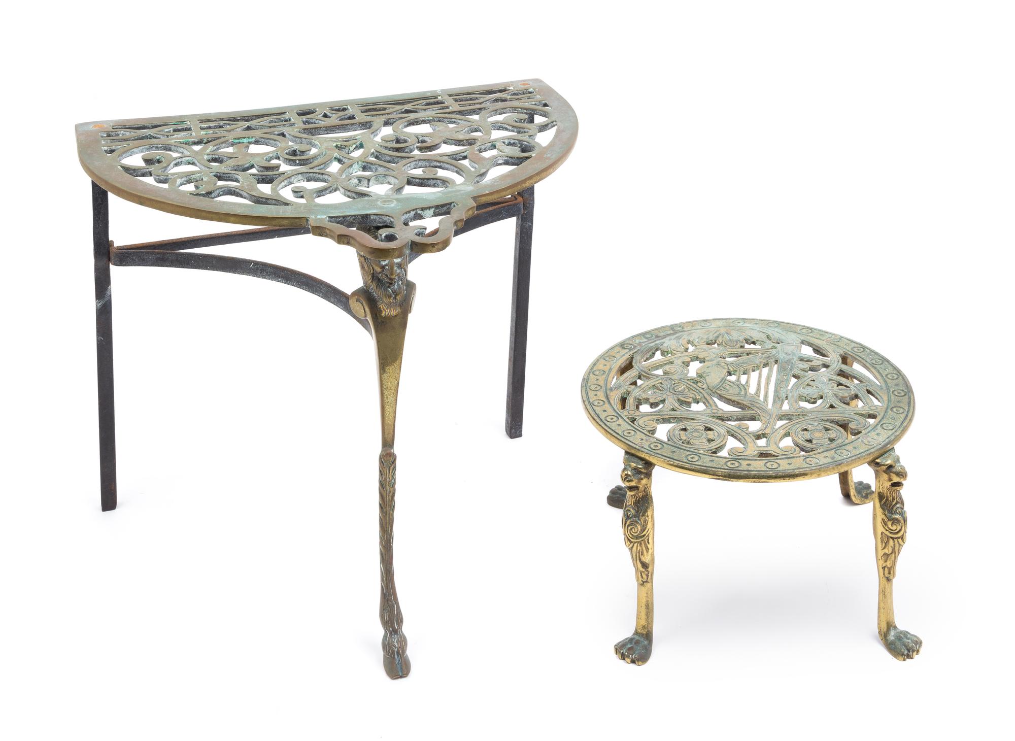 Two Brass Kettle Stands Height of first 12 1/8 inches.