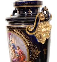 A Pair of Sèvres Style Porcelain Urns Mounted as Lamps