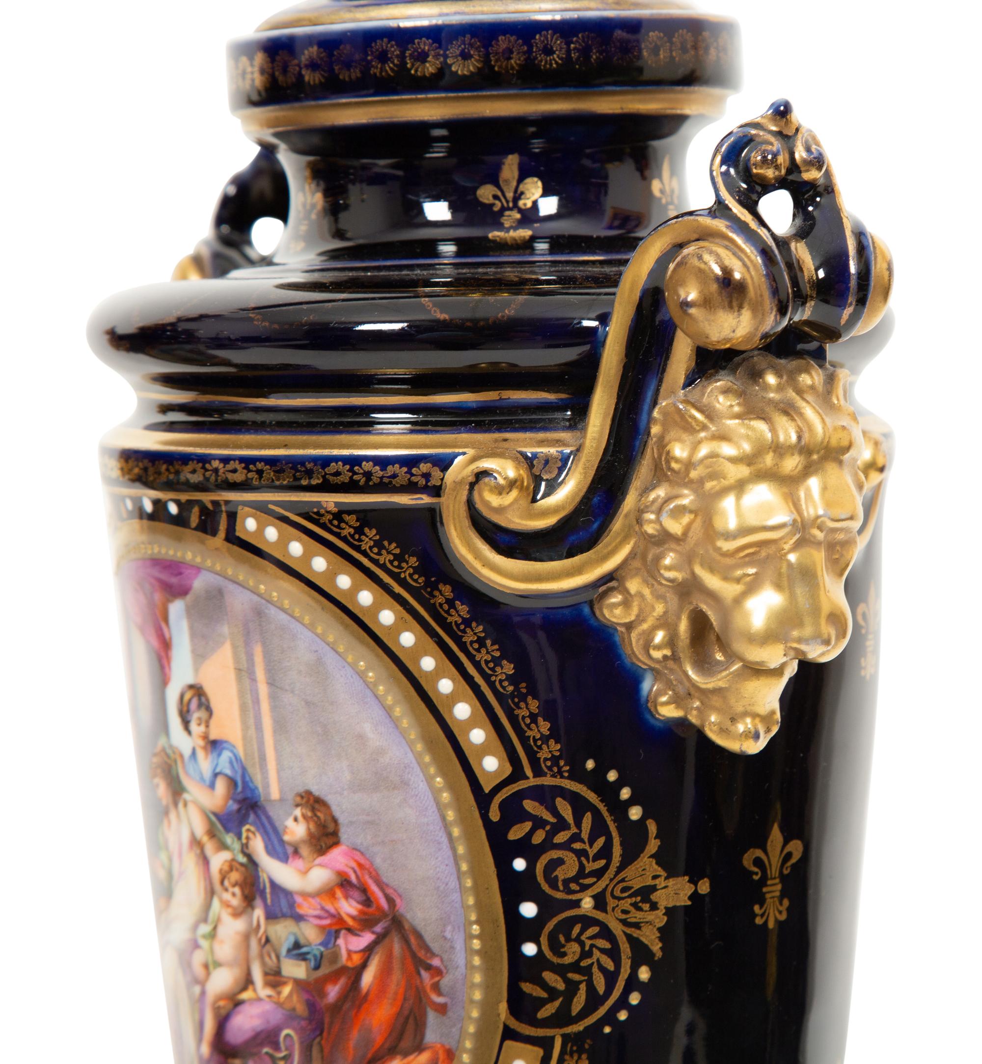 A Pair of Sèvres Style Porcelain Urns Mounted as Lamps
