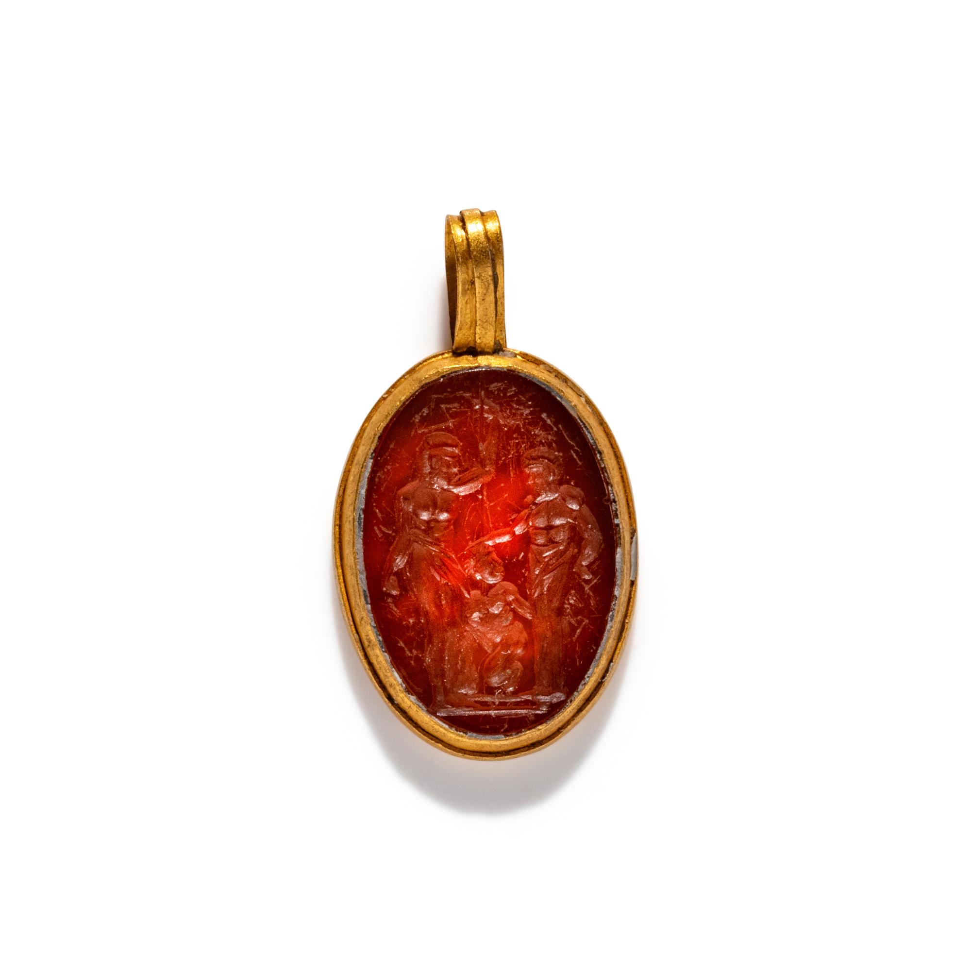 A Carnelian and Gold Pendant with an Erotic Scene