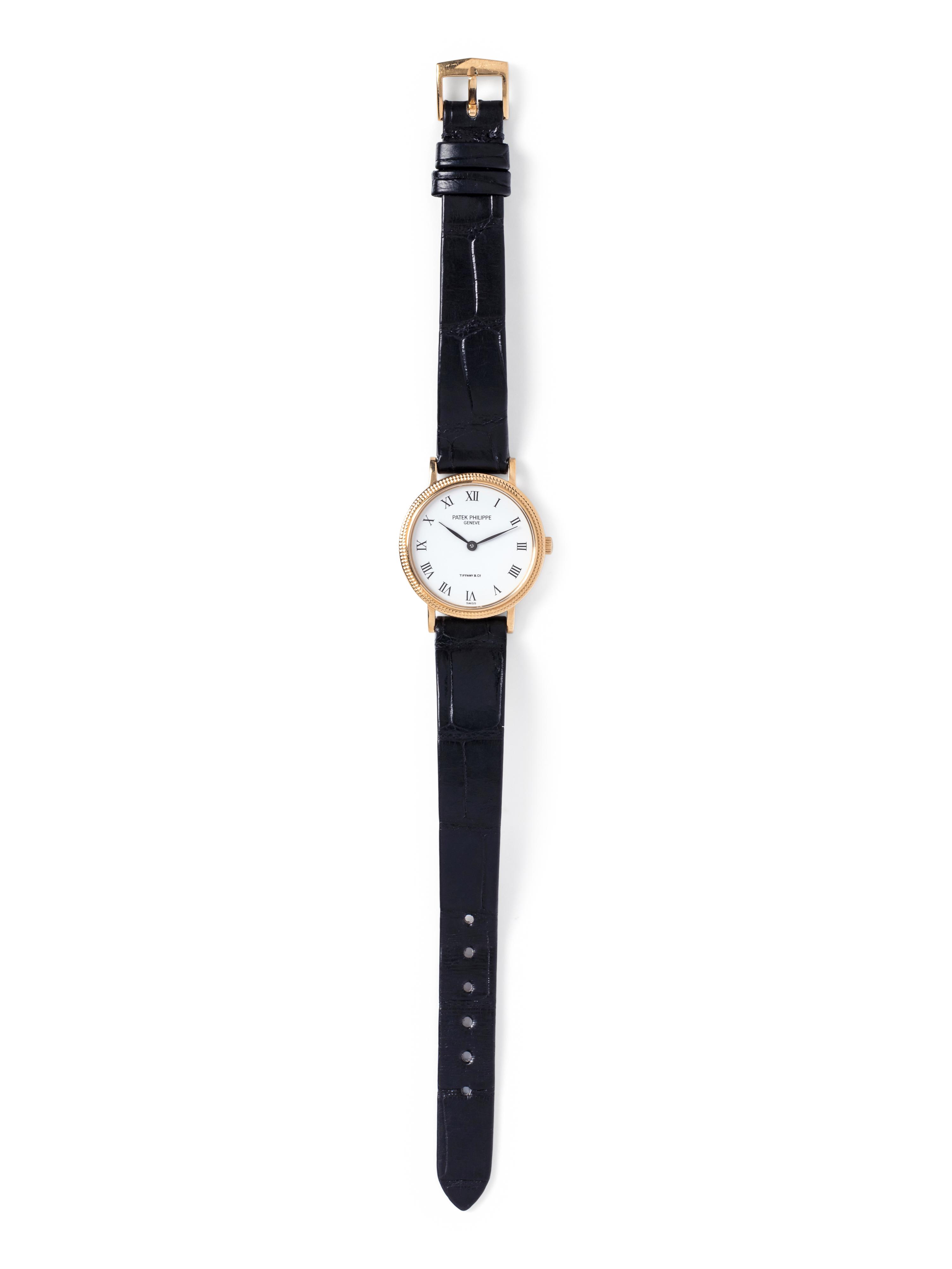 PATEK PHILIPPE, TIFFANY & CO., 18K YELLOW GOLD REF. 4819 'CALATRAVA' WRISTWATCH