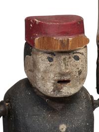 A Carved and Painted Wood Whirligig