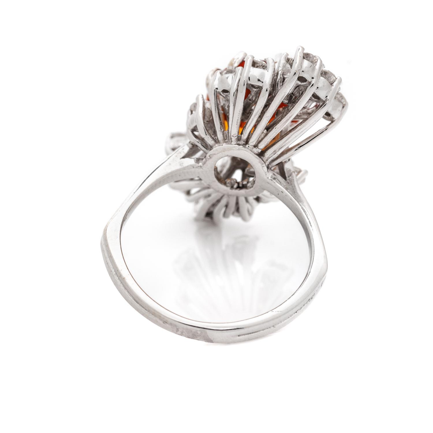 ORANGE SAPPHIRE AND DIAMOND RING