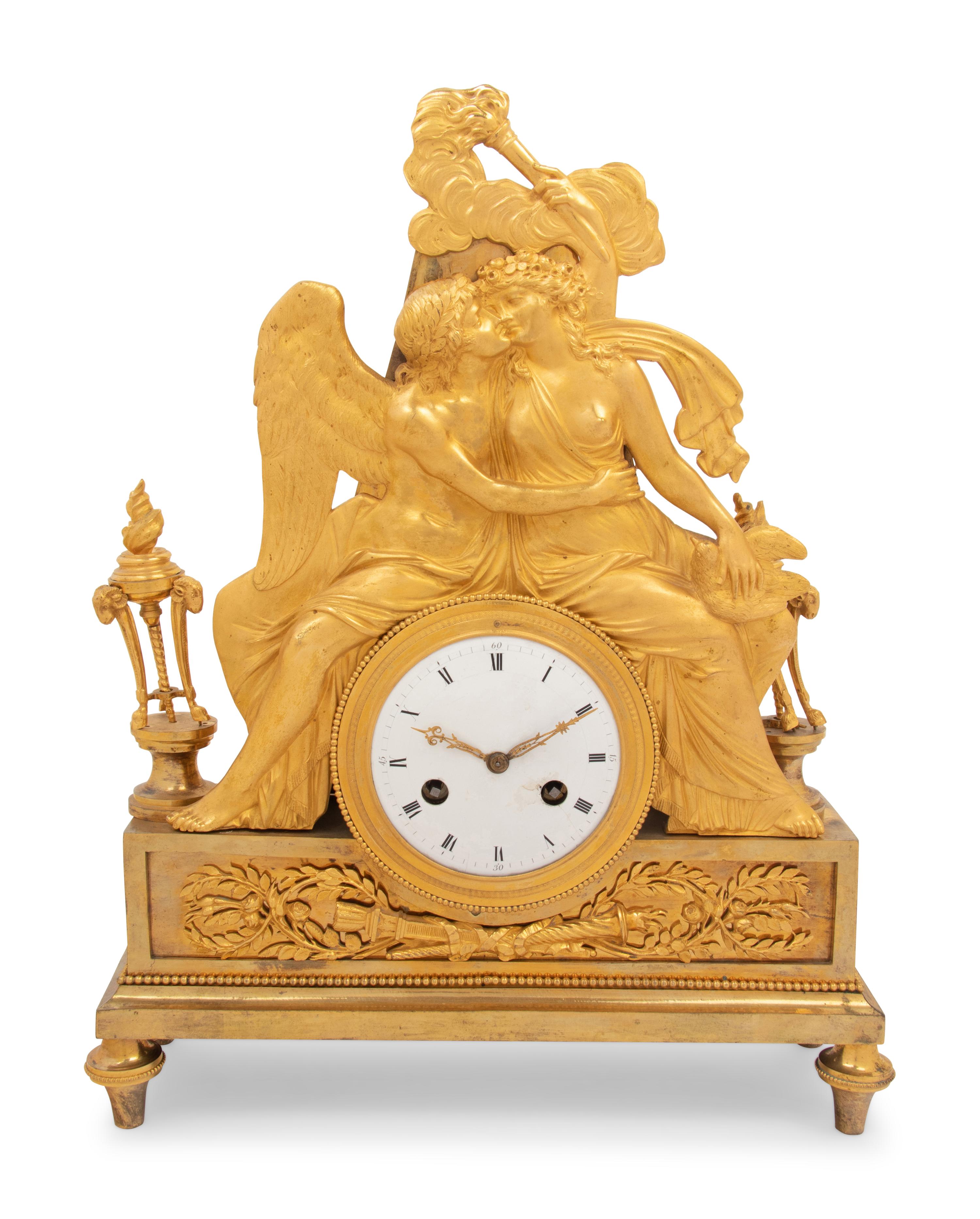 An Empire Gilt Bronze Figural Mantel Clock