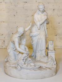 A Bisque Figural Group Height 20 inches.