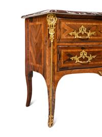 A Régence Gilt Bronze Mounted Marble-Top Commode