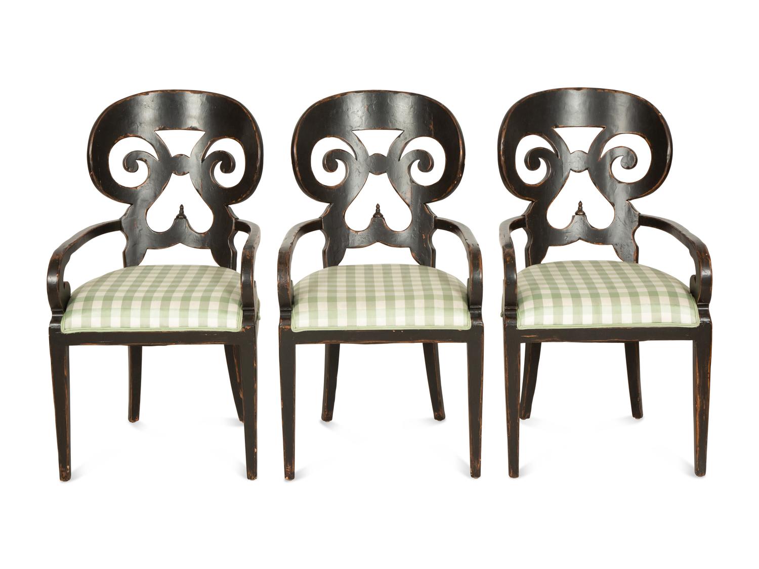 A Set of Six Continental Black Lacquer Scroll Back Armchairs