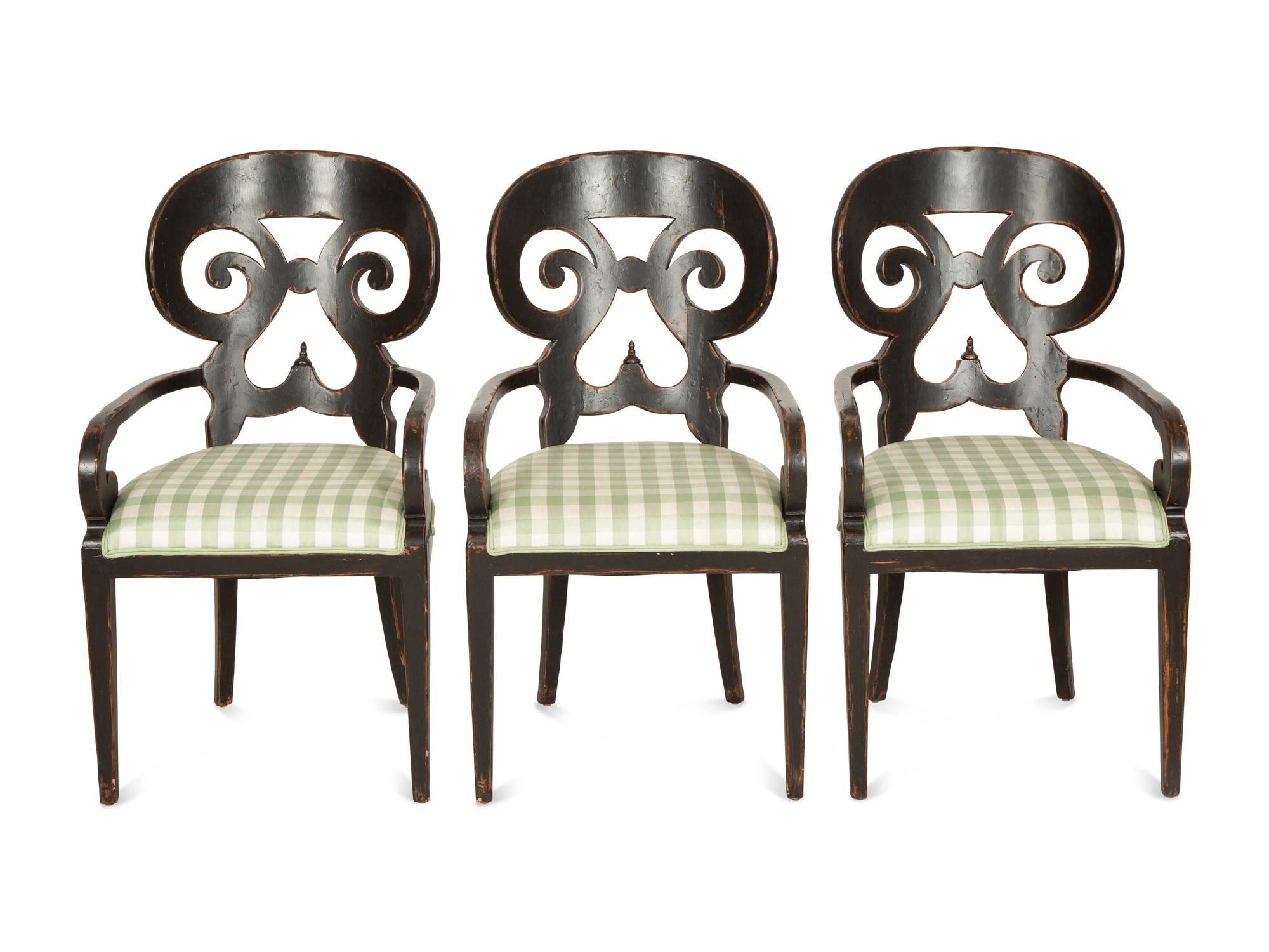 A Set of Six Continental Black Lacquer Scroll Back Armchairs