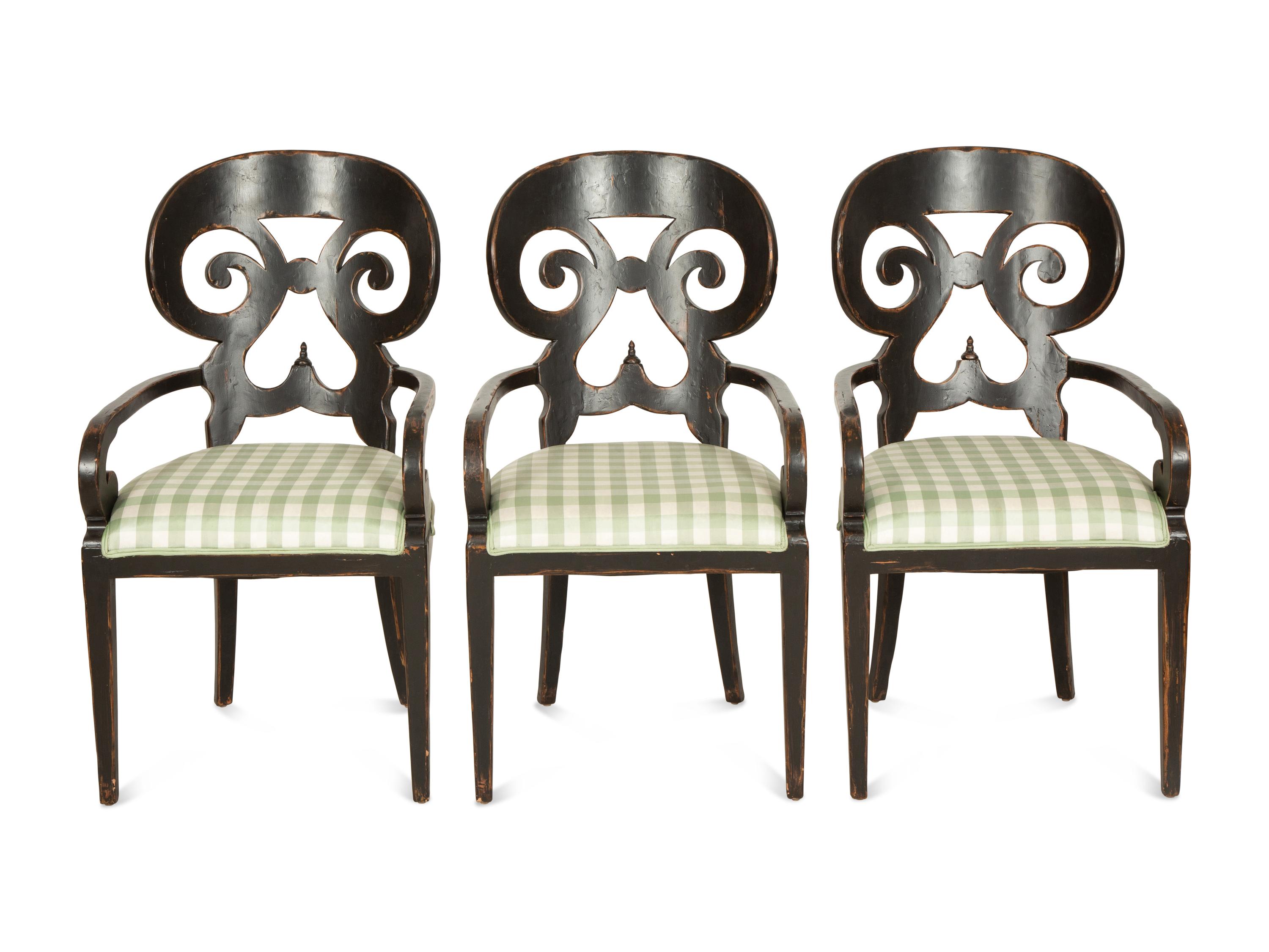 A Set of Six Continental Black Lacquer Scroll Back Armchairs