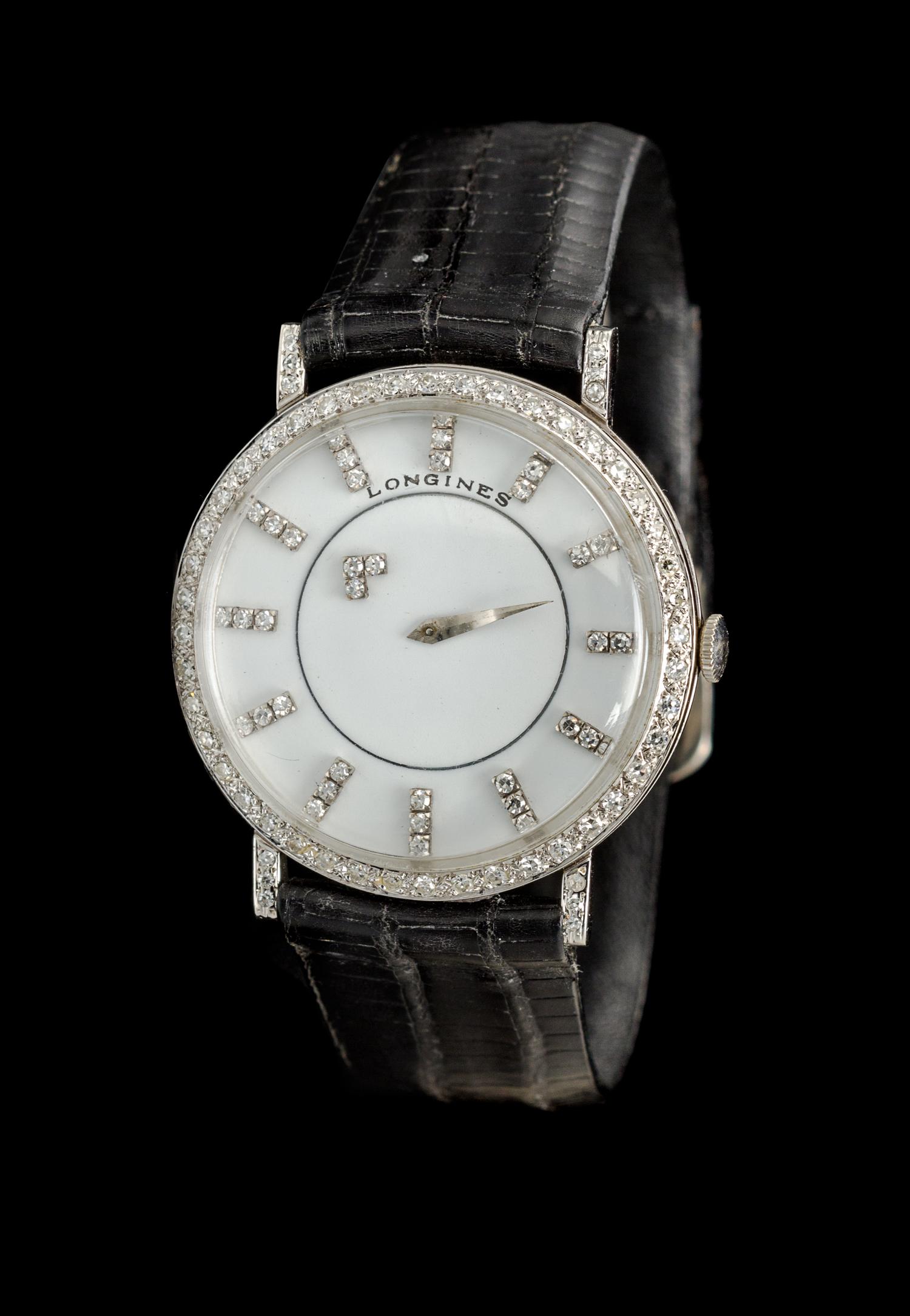 An 18 Karat White Gold and Diamond Ref. 167B Mystery Wristwatch, Longines,