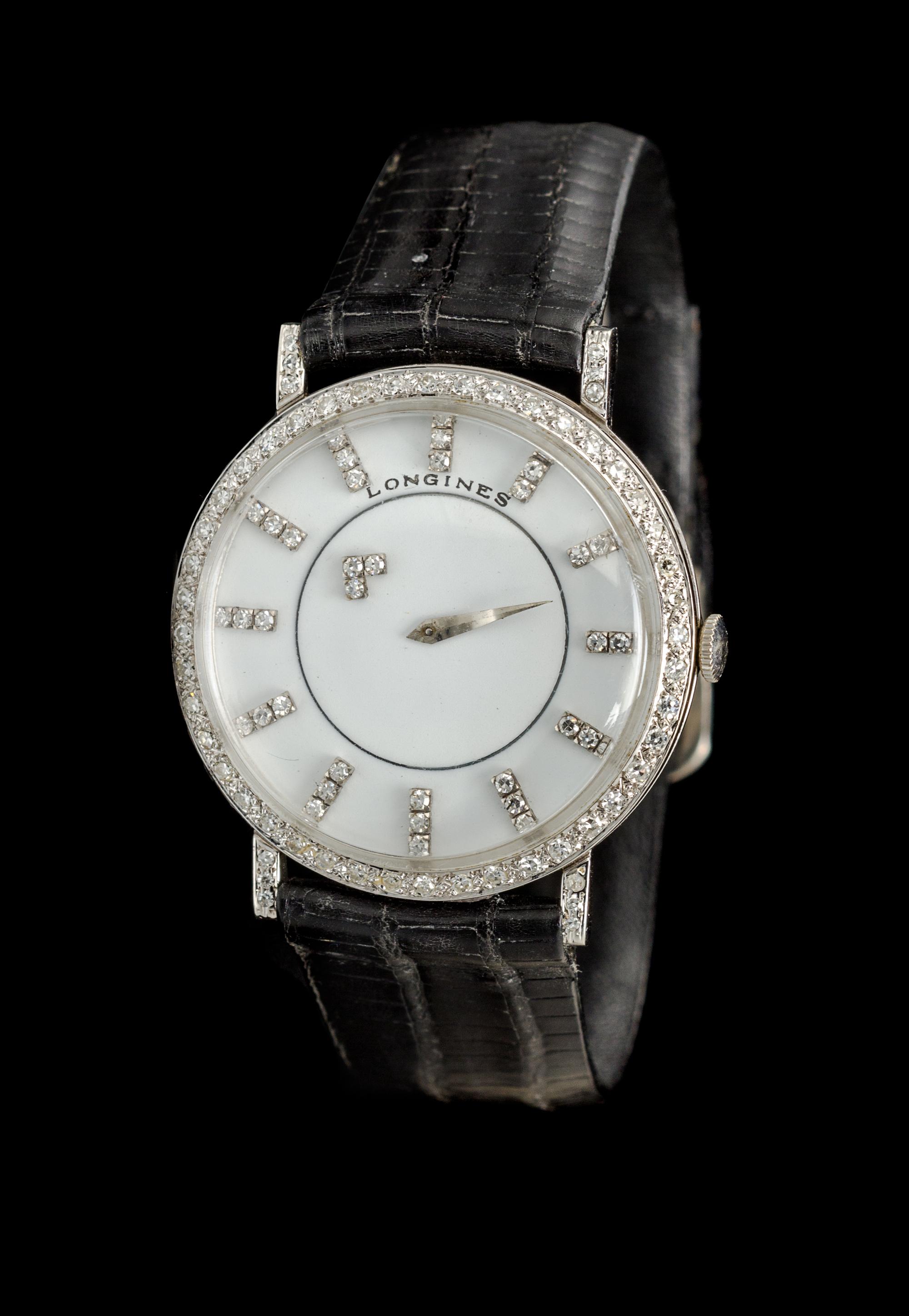 An 18 Karat White Gold and Diamond Ref. 167B Mystery Wristwatch, Longines,