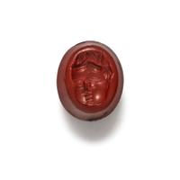 A Roman Red Jasper Ring Stone with the Head of a Baby