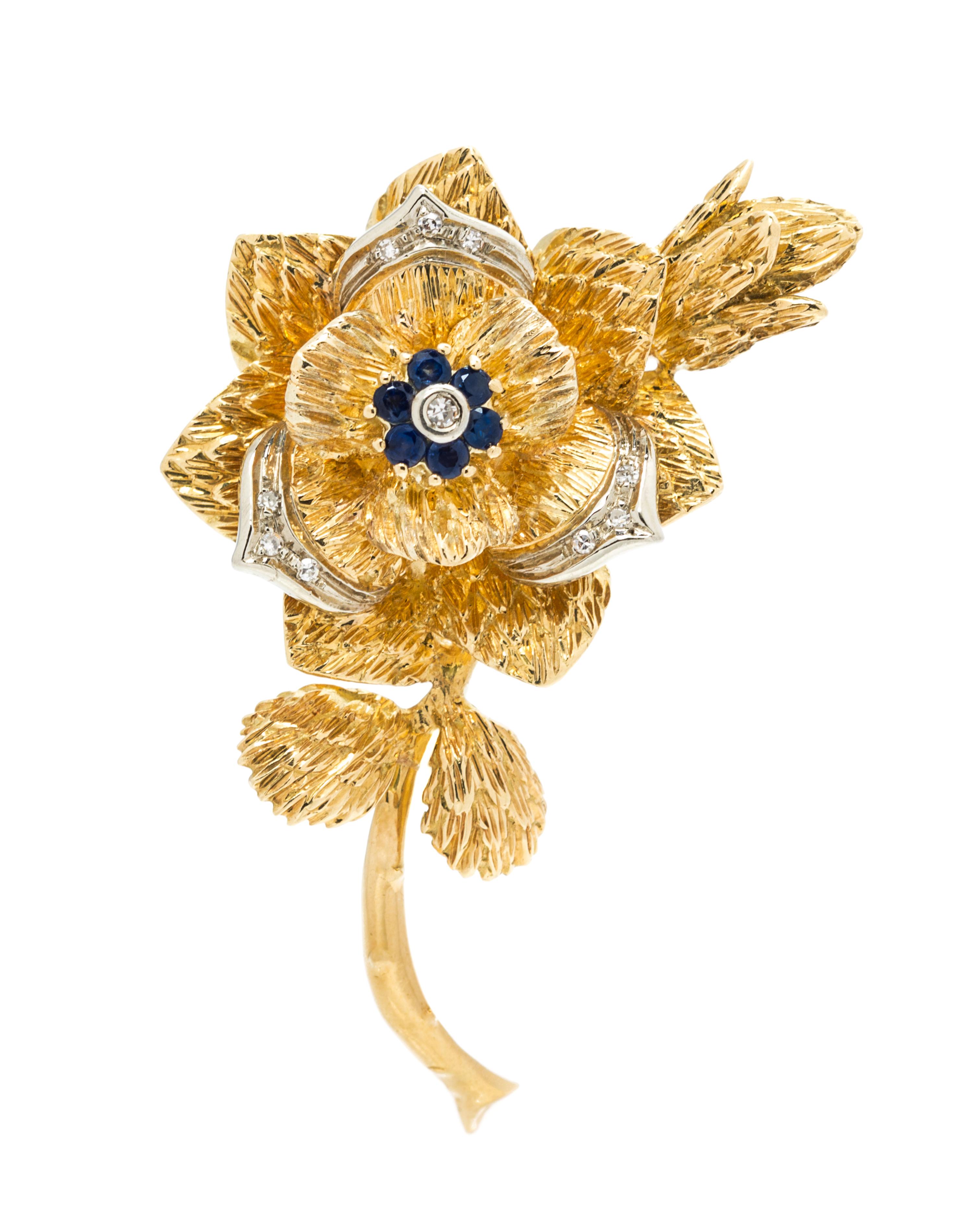 An 18 Karat Yellow Gold, Sapphire and Diamond Flower Brooch, 11.80 dwts.