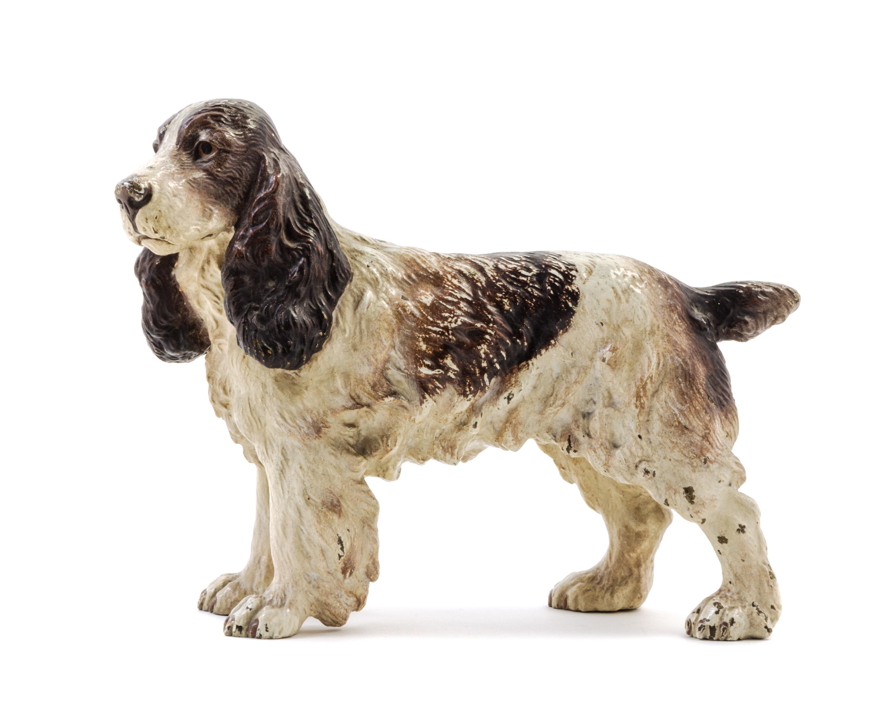 An Austrian Cold-Painted Bronze Model of a Spaniel Height 5 7/8 inches. — CIRCA 1900