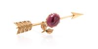 An Antique Yellow Gold and Garnet Plum Arrow Brooch, Tiffany & Co., 5.50 dwts.