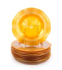 Steuben, EARLY 20TH CENTURY, a set of twelve plates or chargers, of iridescent gold