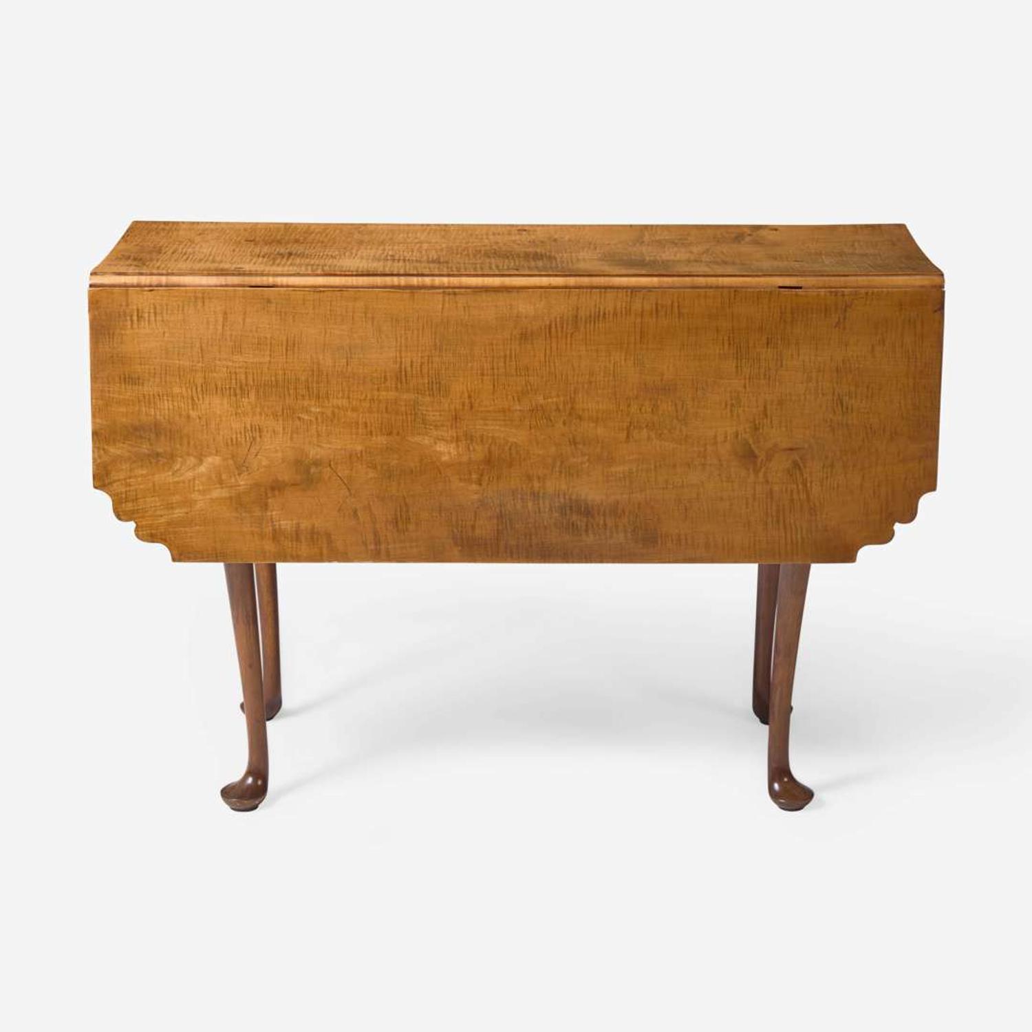 A Queen Anne tiger maple drop leaf table New England, 18th century