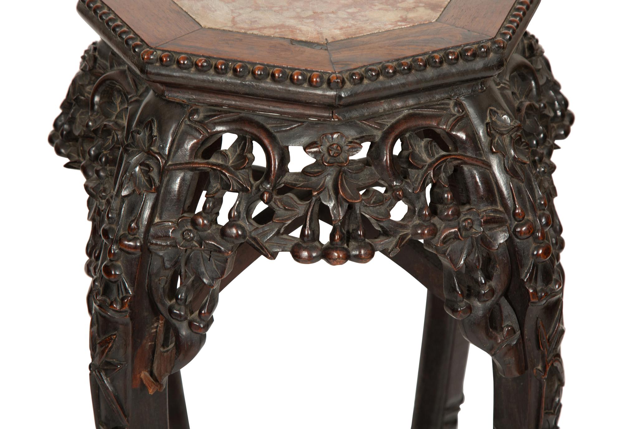 A Pair of Chinese Carved Rosewood Pedestals