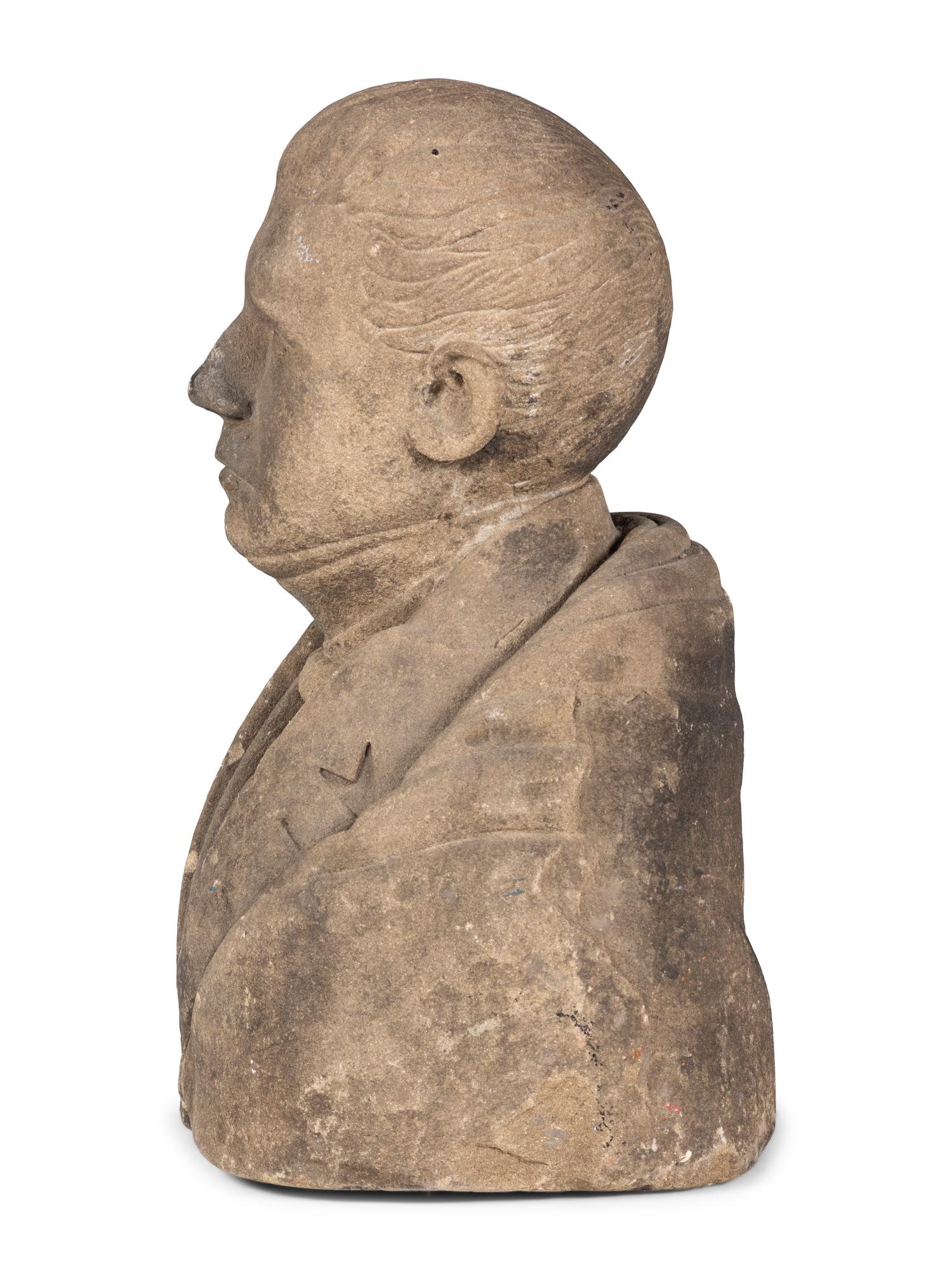 A Carved Stone Bust of a Gentleman