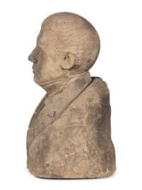 A Carved Stone Bust of a Gentleman