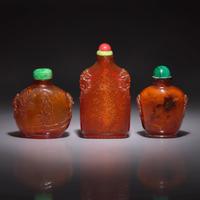 Three Chinese Amber Snuff Bottles, 18th to 19th Century — 清中期 琥珀鼻烟壺三支