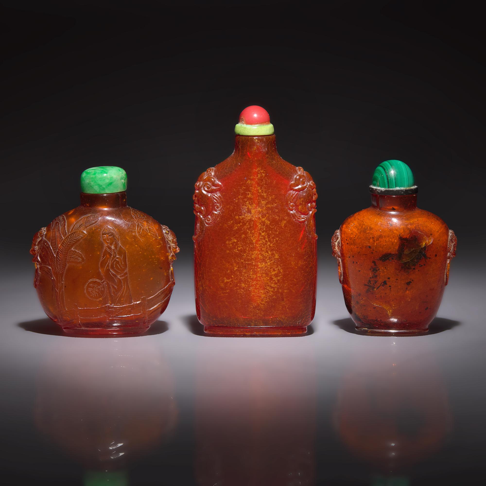 Three Chinese Amber Snuff Bottles, 18th to 19th Century — 清中期 琥珀鼻烟壺三支