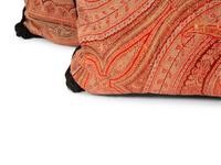 Four Paisley Covered Pillows with Black Braid Trim