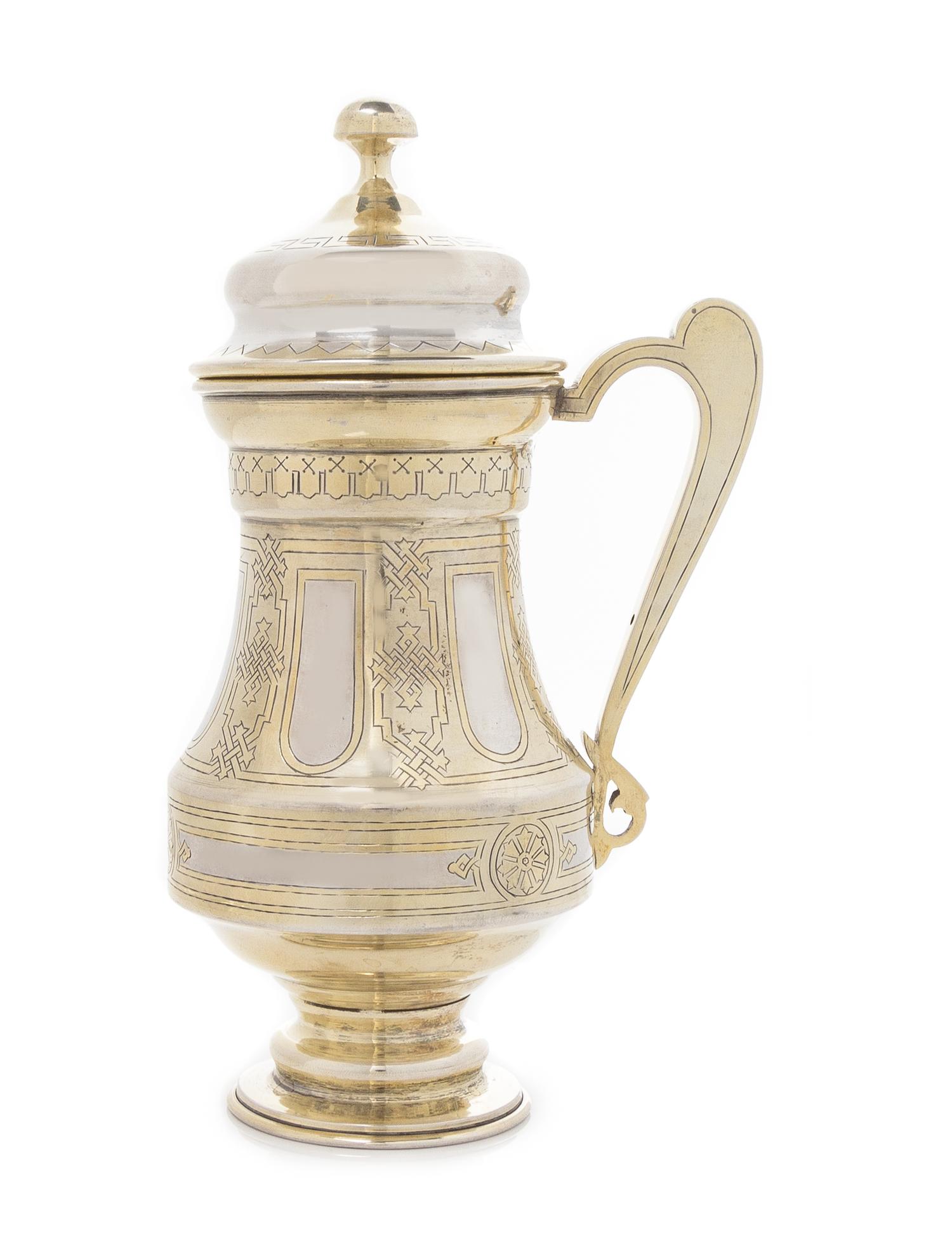 A Russian Silver and Parcel Gilt Tankard, Mark of Alexander Mukin, Assay of Viktor Savinsky, Moscow, 1876, the baluster form body decor