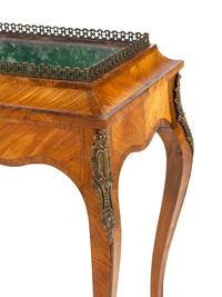 A Louis XV Style Gilt Bronze Mounted Kingwood Jardinière Stand