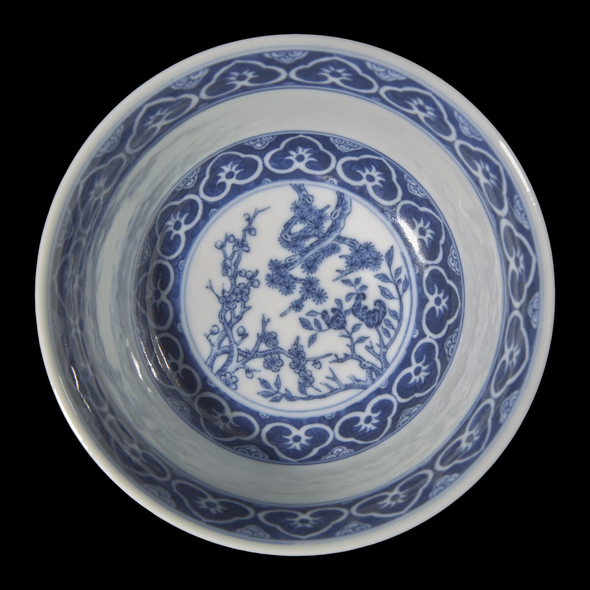A Chinese Blue and White Porcelain 'Imperial Poem' Tea Bowl and Cover, Qianlong Mark 清乾隆丙寅（1746）款 青花御題三清茶詩蓋碗