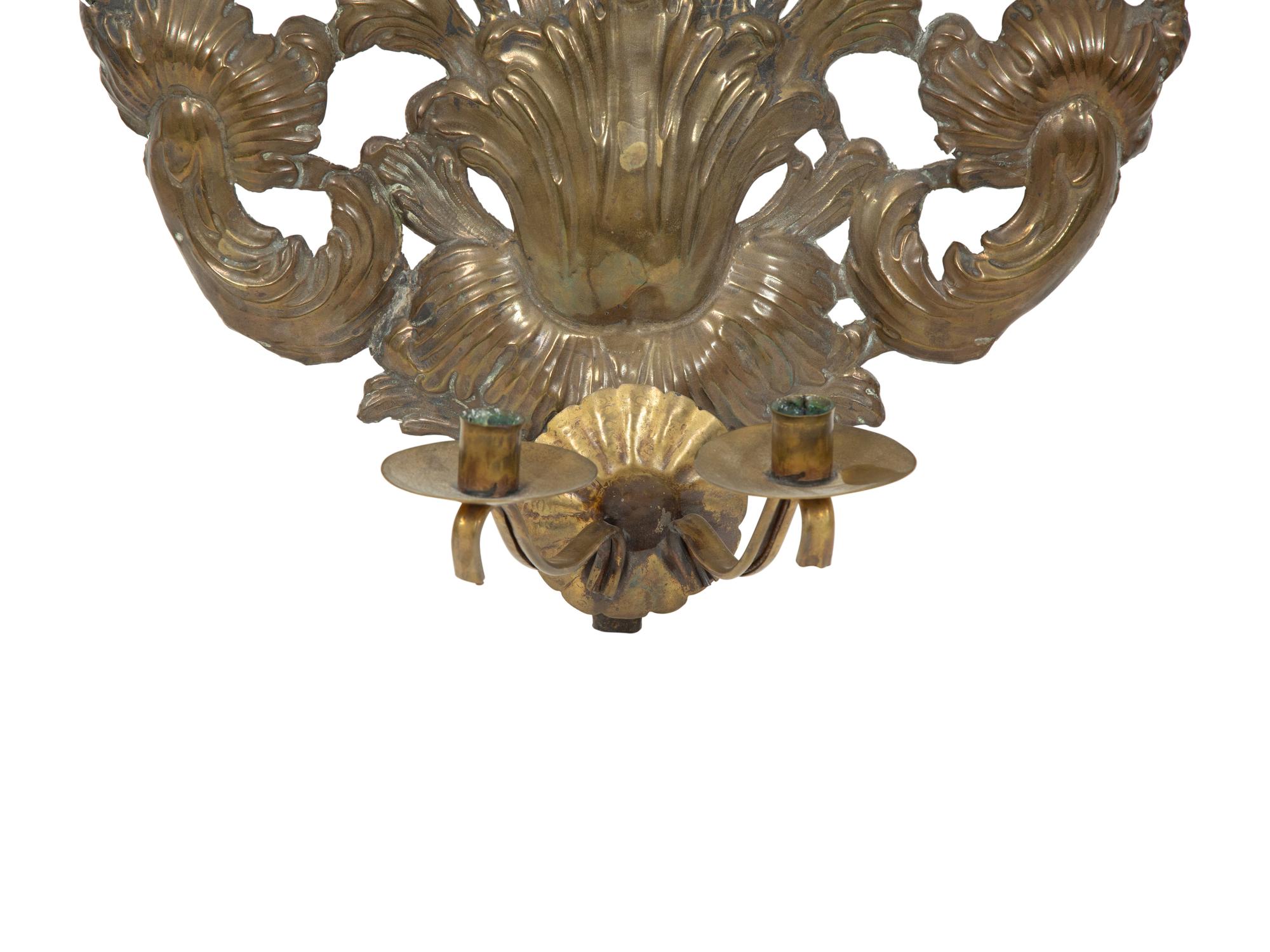 A Pair of Dutch Chased Brass Two-Light Sconces