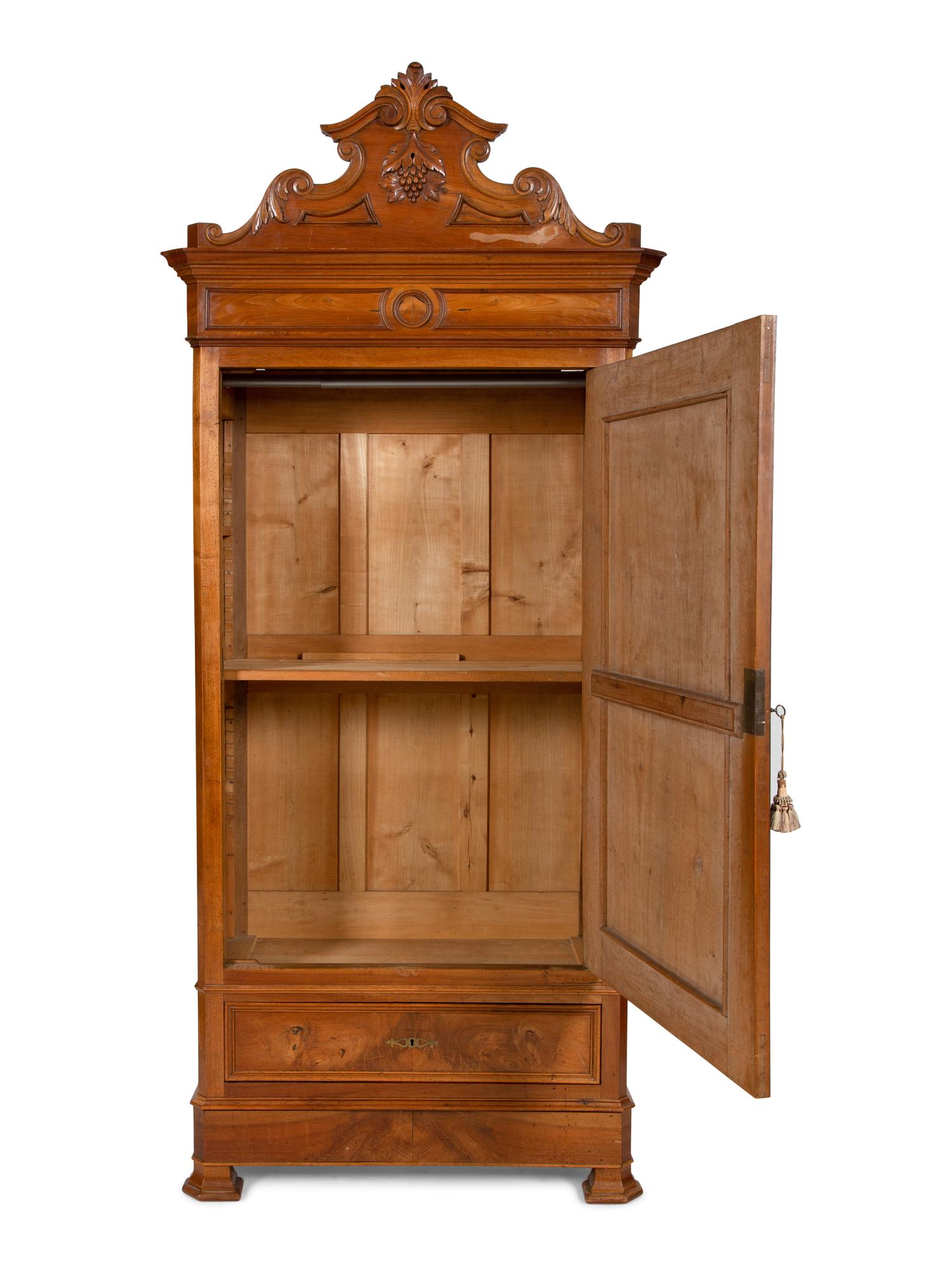 An Italian Figured Walnut Wardrobe Cabinet