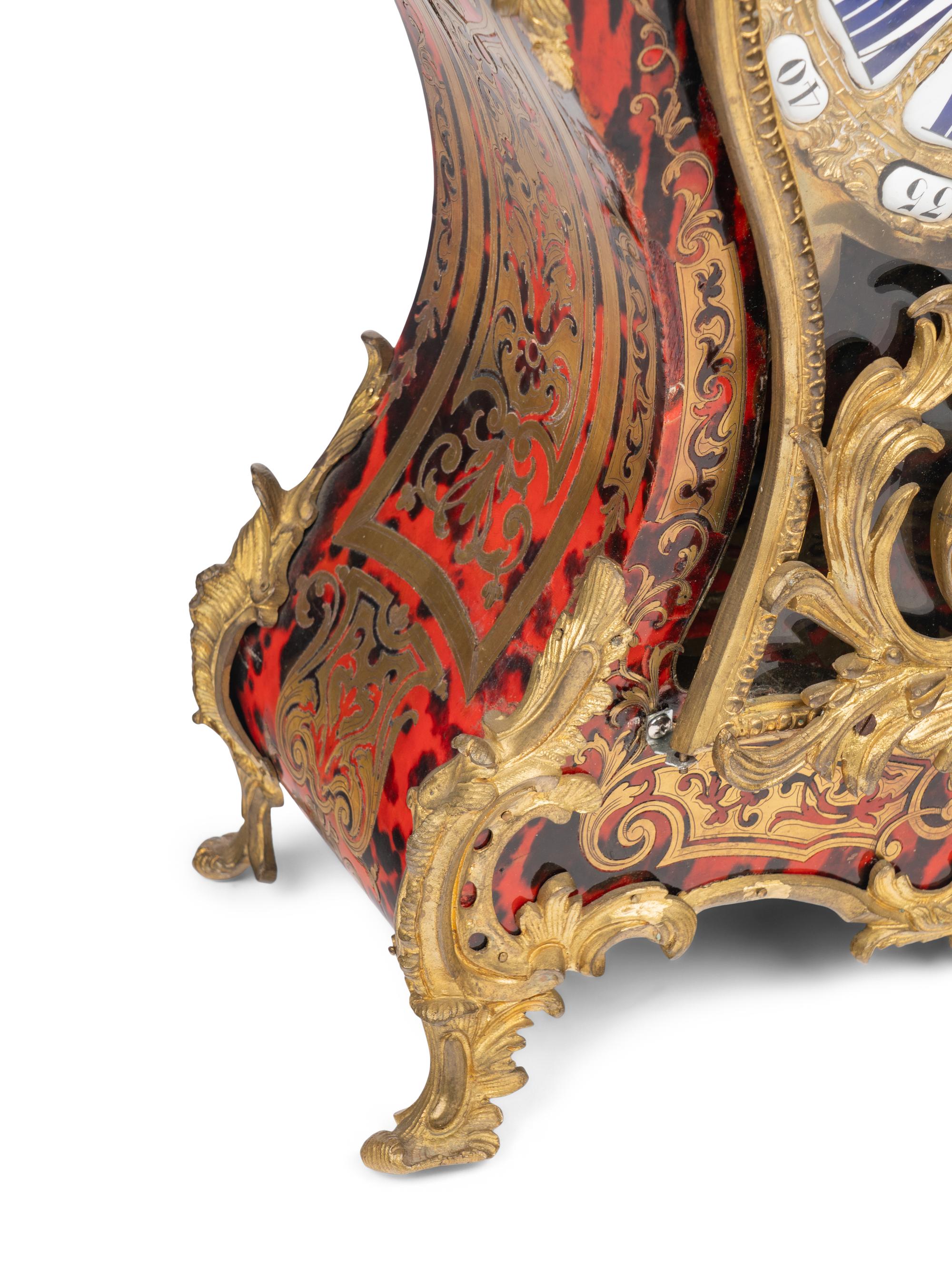 A Napoleon III Gilt Bronze and Boulle Marquetry Mantel Clock