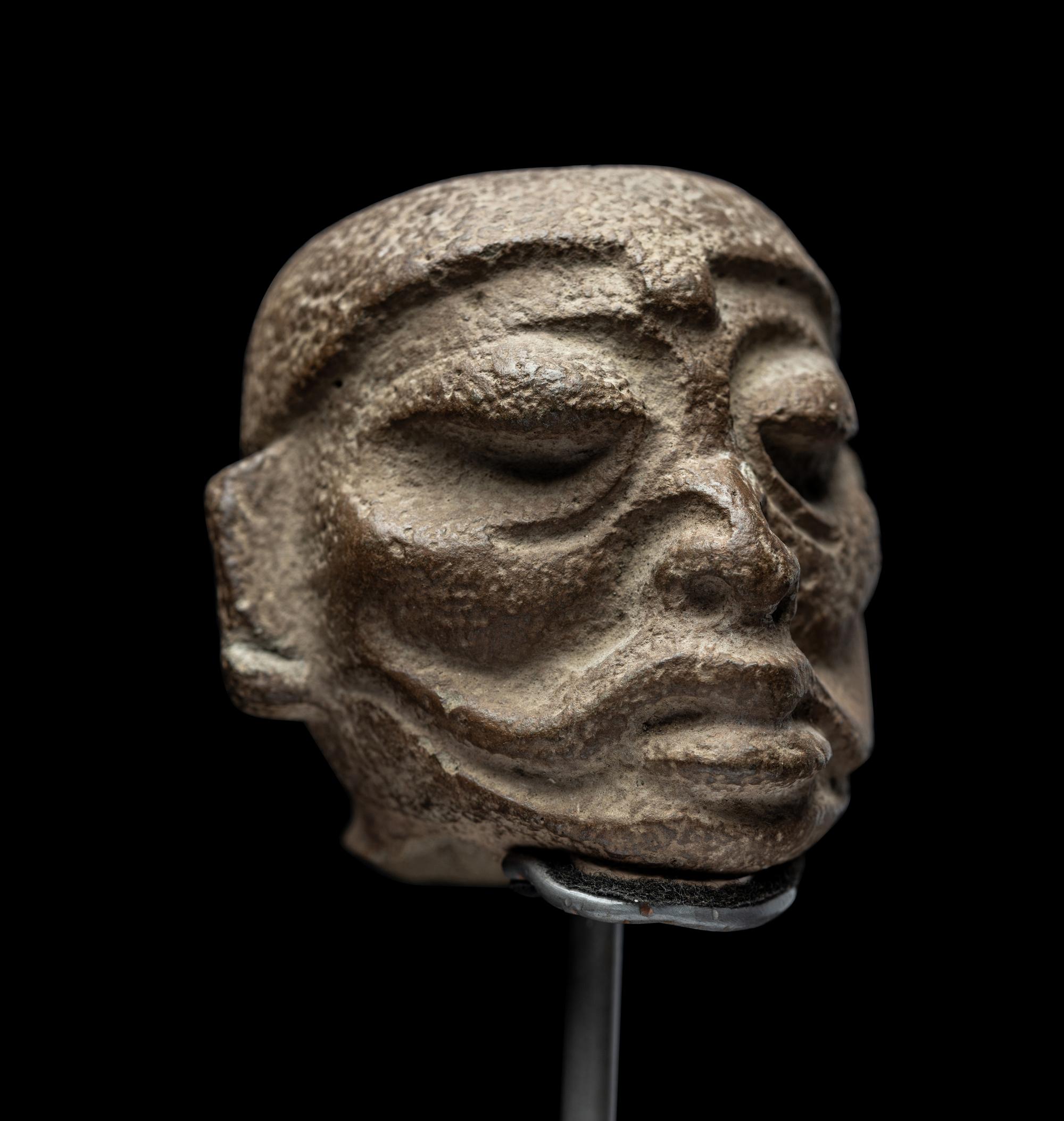 A Maya Terracotta Head from a Figural Vessel