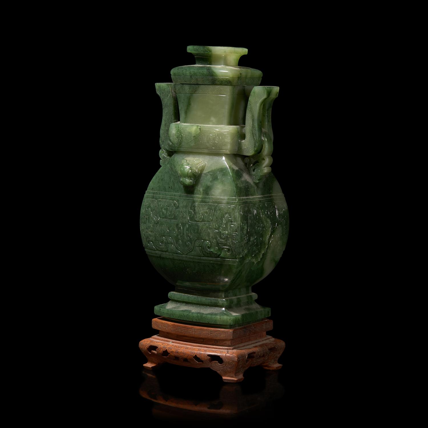 A Chinese Spinach Jade Archaistic Vase and Cover 碧玉雕饕餮紋仿古蓋瓶 帶木座